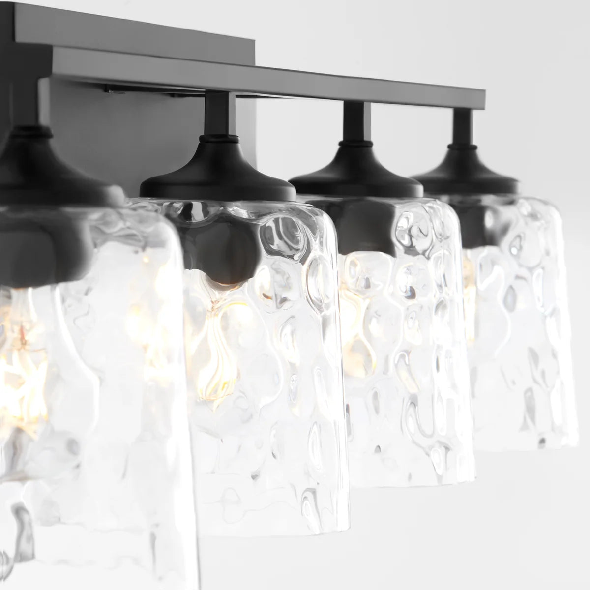 Quorum Eldorado 5005-4-159 4 Light Vanity Clear Hammered Glass Shade Transitional - Matte Black