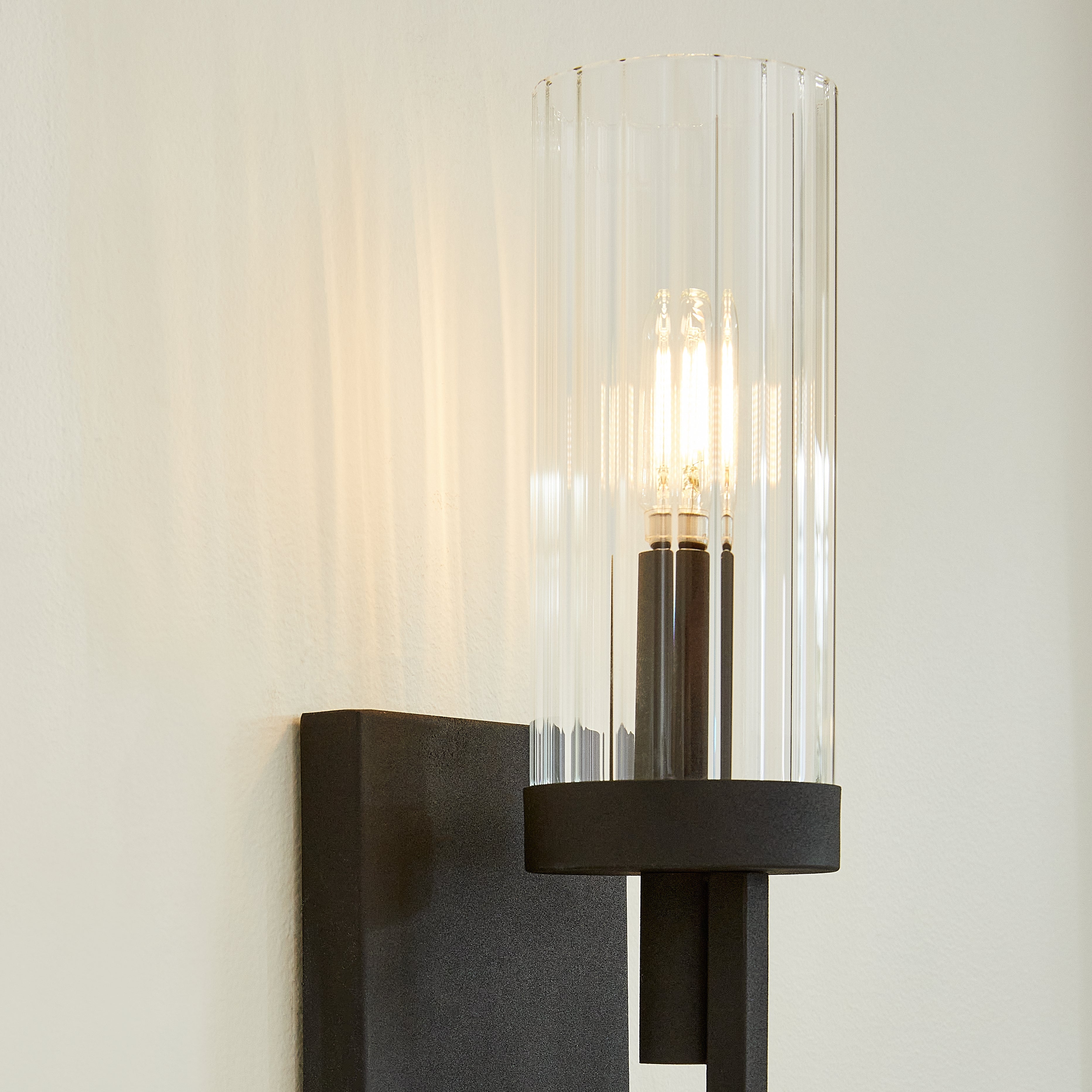 Quorum Ladin 501-1-69 Wall Mount - Textured Black W/ Clear Fluted Glass